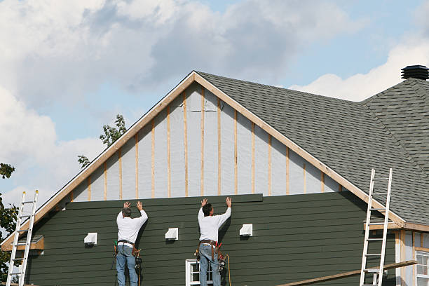 Professional Siding Installation technician working in King William, VA